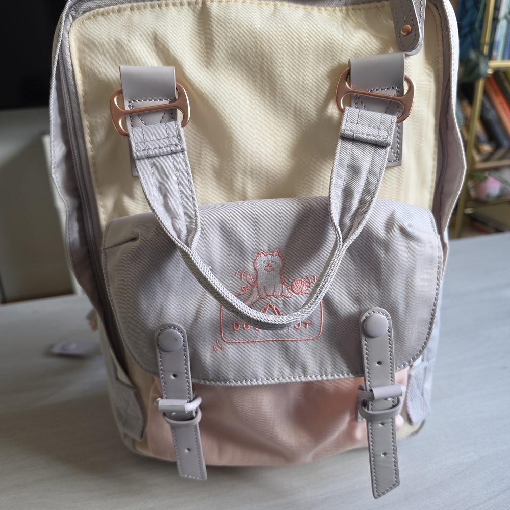 Doughnut Macaroon 16L Pastel Multi-Color Backpack With 14 Inch Laptop Sleeve - Picture 2 of 6